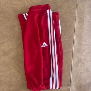 Red adidas joggers
